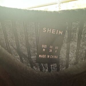 Shein Jump Suit Size Medium fit like a Small.